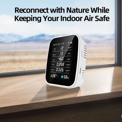 Air quality monitor placed on a balcony, combining indoor air safety with an outdoor nature view.