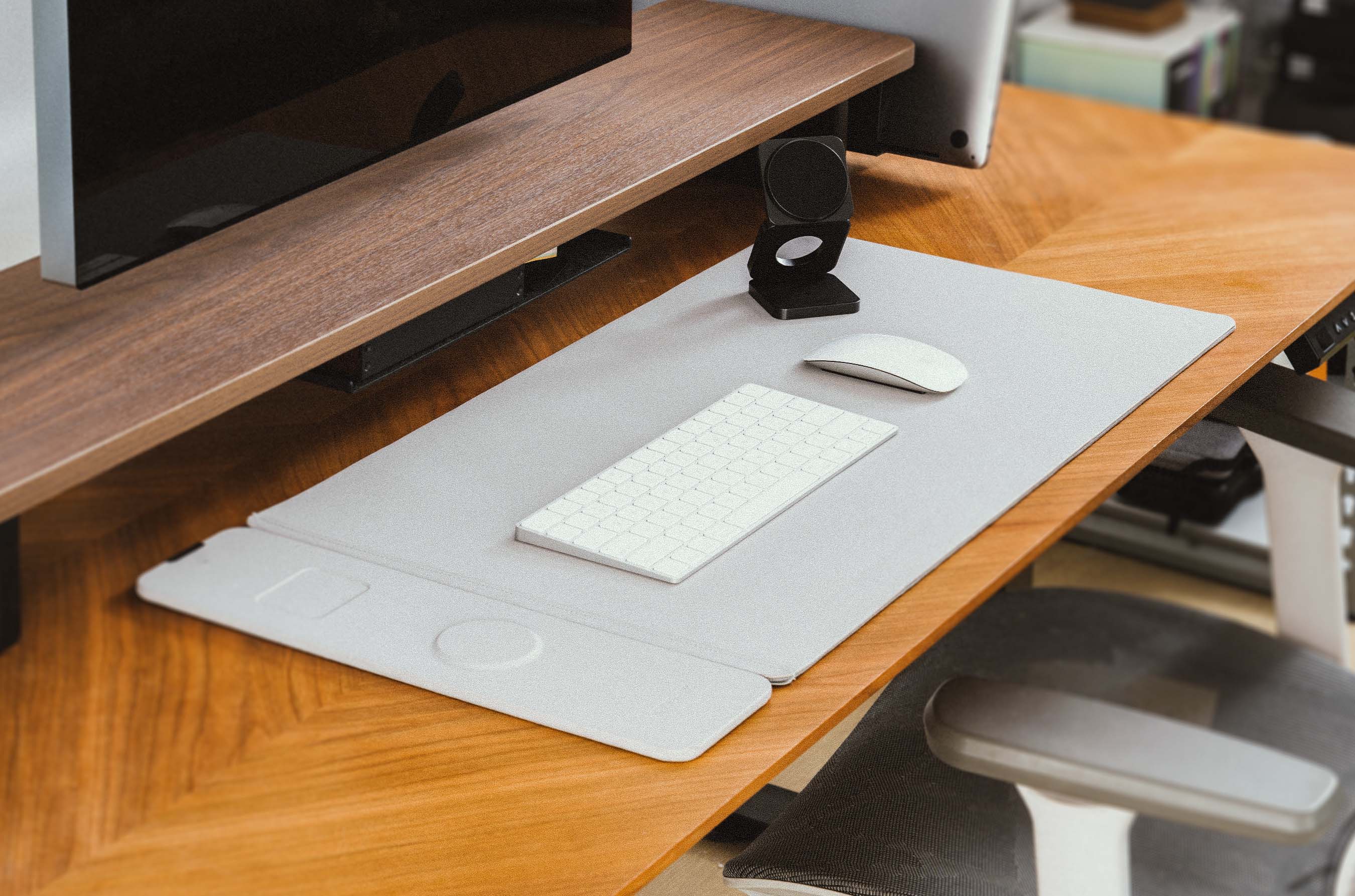 NeoDesk Leather Dual-Layer Wireless Charging Desk Mat and Ultra Portable 3-in-1 Wireless Charger styled in a contemporary workspace setup, showcasing functionality and minimalistic design in the ‘Shop the Look’ section.