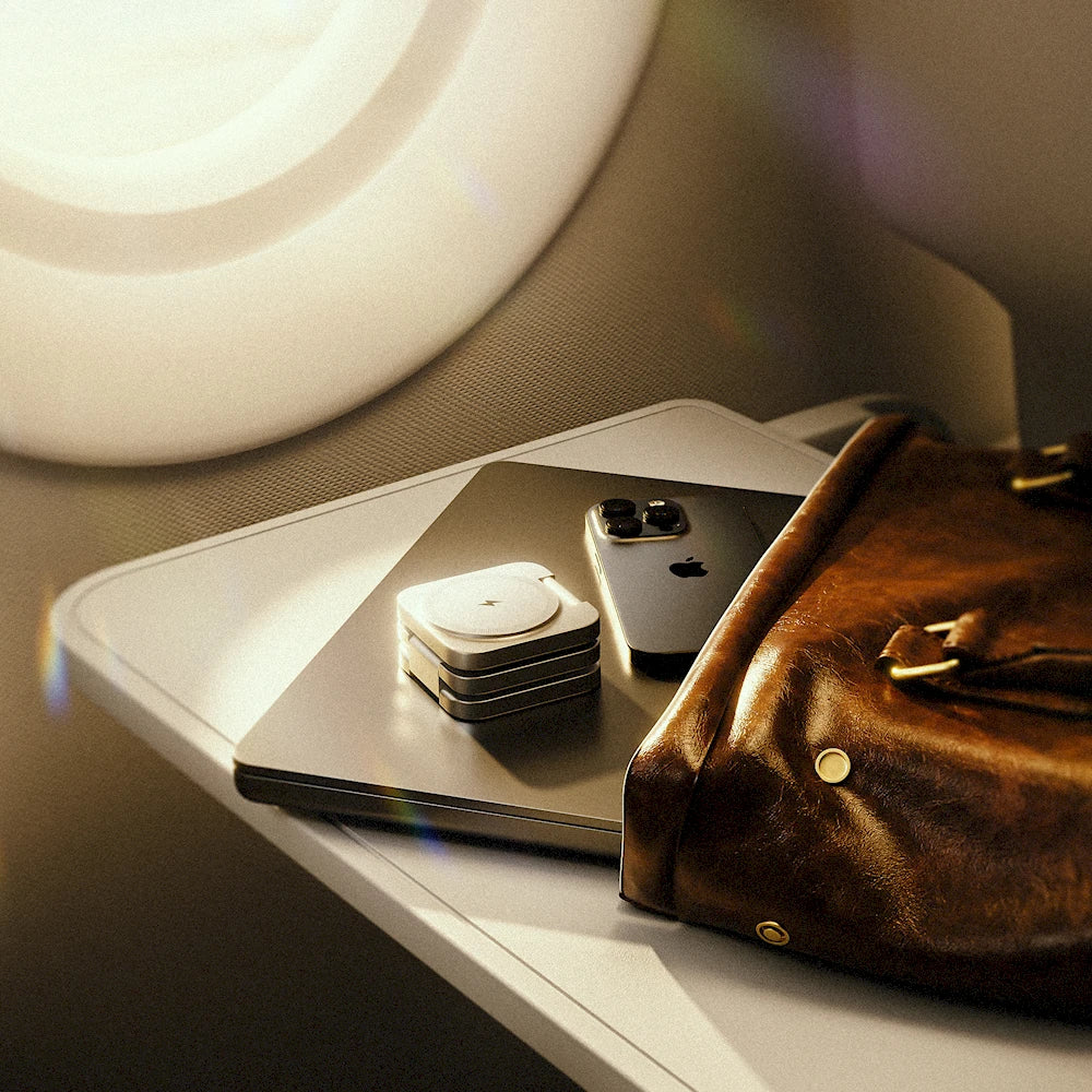 NeoDesk Portable 3-in-1 Wireless Charger placed in a travel bag, showcasing its compact and travel-friendly design for efficient charging on the go.