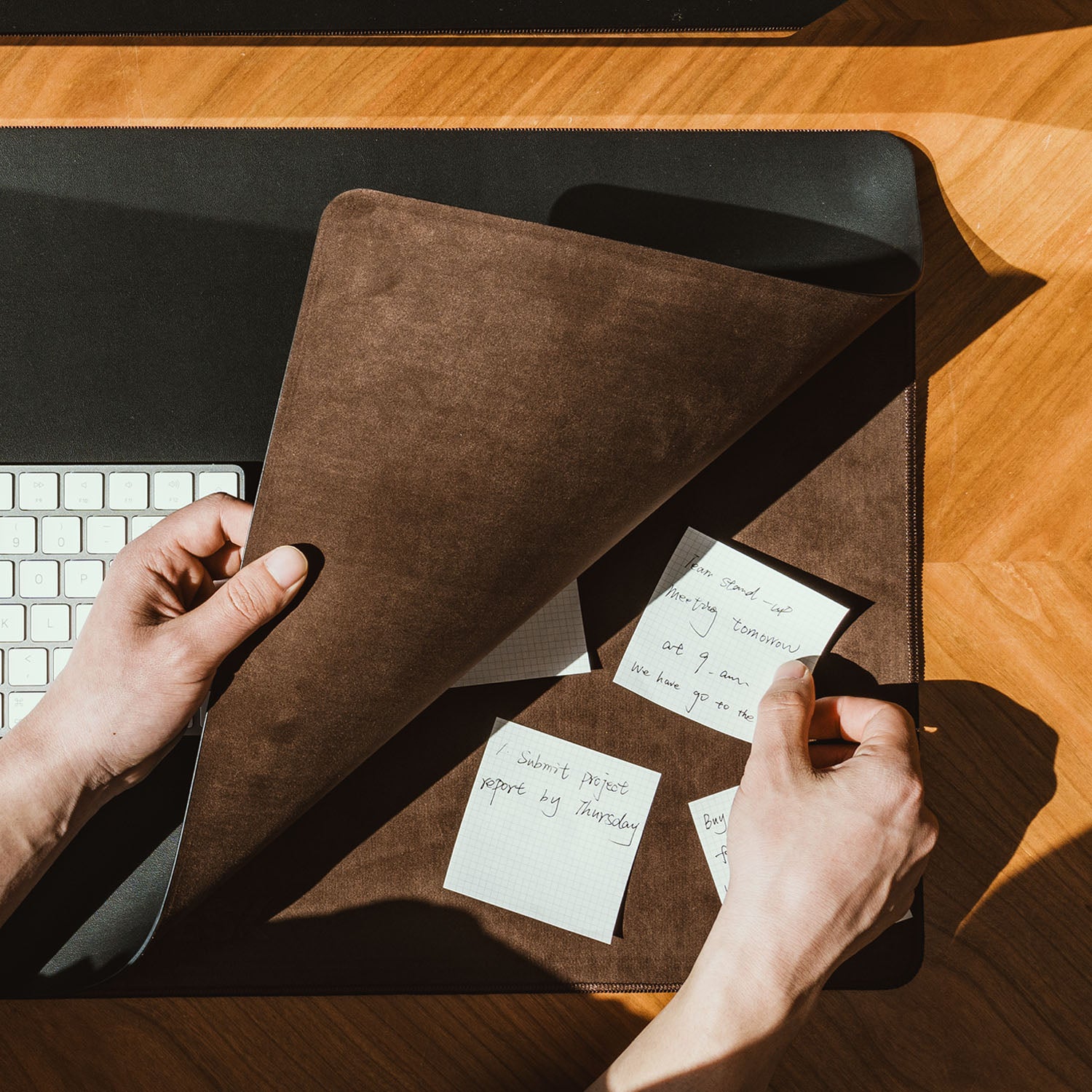 NeoDesk wireless charging desk mat with layered smart storage, perfect for organizing notes and documents.